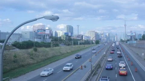 Toronto Highway with CN Tower Stockbeeldmateriaal 42128688
