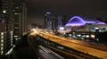 Toronto highway at night with skydome. Timelapse. HD Footage