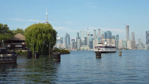 Toronto Island View with Ferry and City Skyline on a Clear Day Stock Footage 329409974