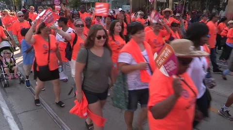 Toronto labor day parade as thousands of workers protest for labour unions Stock Footage 54426828