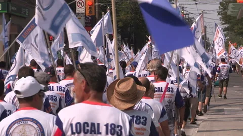 Toronto labor day parade as thousands of workers protest for labour unions Video stock 54459645