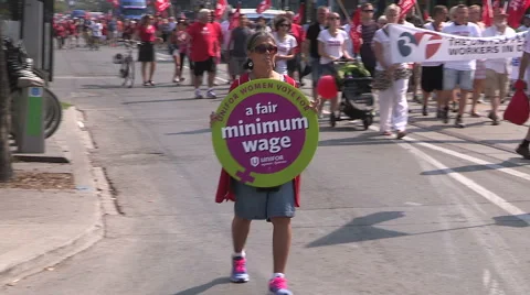 Toronto labor day parade as thousands of workers protest for labour unions Stock Footage 54460380