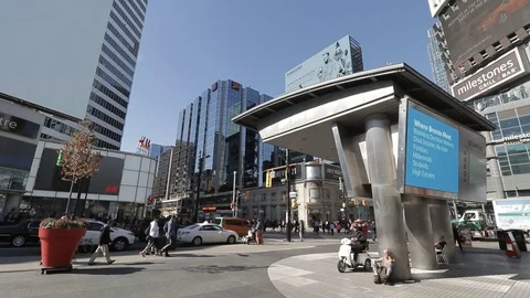 Toronto landmark Yonge-Dundas Square on a weekday afternoon Stock Footage 73580702