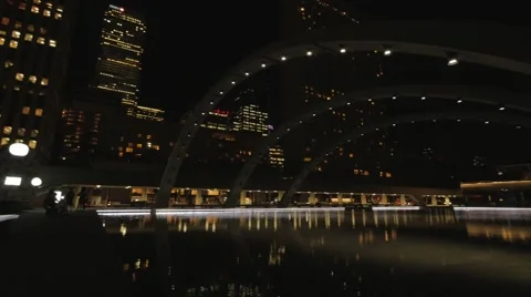 Toronto Nathan Phillips Square Night Pond Arches Pan Video stock 50255681