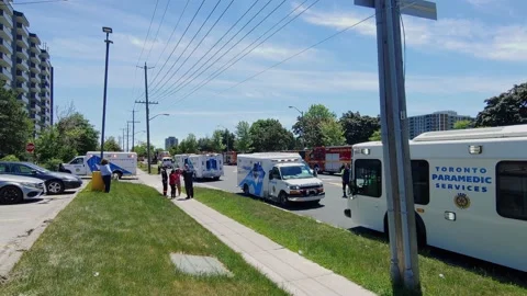Toronto Paramedic Ambulances And Fire Trucks Parked On The Roadsides In 스톡 동영상 153262353