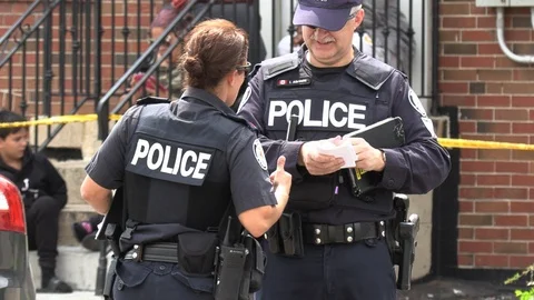 Toronto police at crime scene of drive b... | Stock Video | Pond5