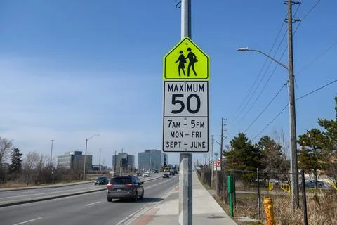 Toronto School Zone Speed Limit Sign on Roadside Stock Photos