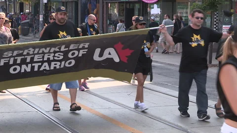 Toronto, On Sept 4 2025 Labor day parade protest for unions and skilled trades Video stock 341346792