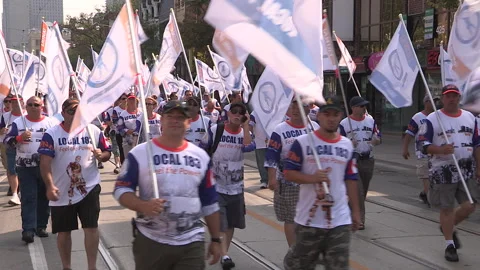 Toronto, On Sept 4 2025 Labor day parade protest for unions and skilled trades Video stock 341346835