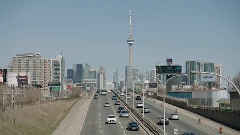 Toronto skyline from busy highway 4K Stock Footage