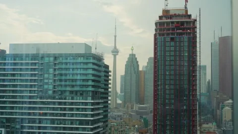 Toronto Skyline with CN Tower Between Downtown Skyscrapers Stock Footage 328369887