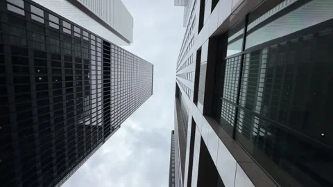 Toronto Skyline Shot From Below With Sunset Light Highlighting Glass Buildings Video stock 314463897