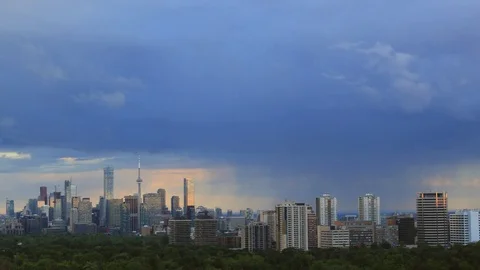 Toronto Skyline With Stormy Clouds Moving Until Dusk Stock Footage 77109863