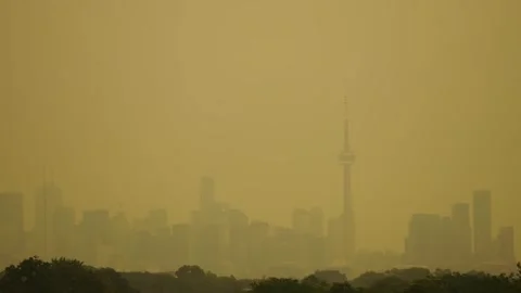 Toronto Skyline Under Orange Wildfire Smoke Haze Stock Footage 342734297