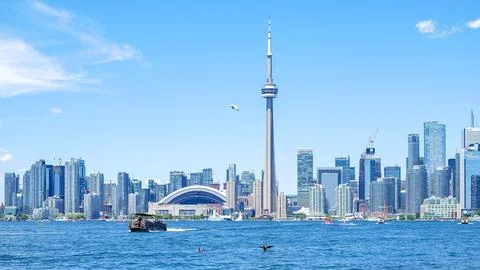 Toronto skyline view featuring the iconic CN Tower, vibrant cityscape with Stock Photos
