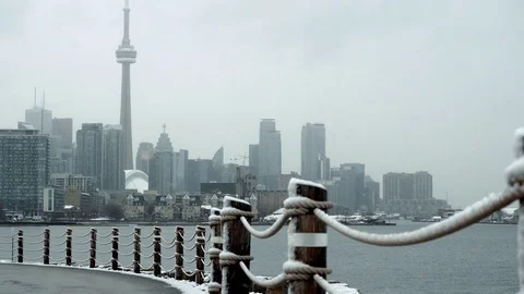 Toronto skyline while snowing Stock Footage 111075582