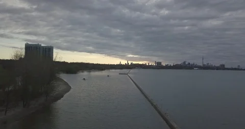 Toronto sunrise overcast camera forward over water 4K Stock Footage 90209118