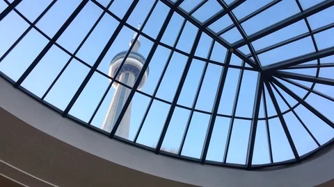 Toronto's Iconic CN Tower Viewed From Inside Metro Centre On Clear Day Stock Footage 88554540