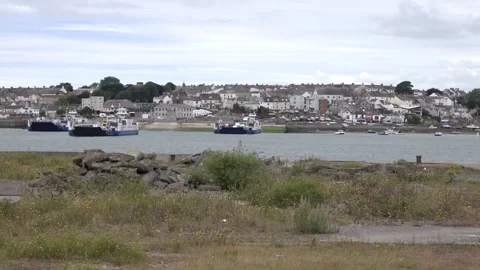 Torpoint ferry Cornwall England. On ferry arriving and one leaving 動画素材 136671047