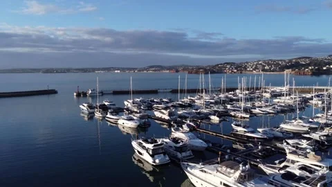 Torquay, Devon, England: Drone Pan L-to-R: Torquay marina, local landmarks Stock Footage 168109982