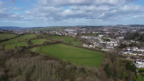 Torquay, Devon, England: Drone View: Cockington Park and Torquay suburbs Stock Footage 197406002
