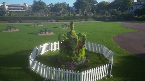 Torquay, Devon, England: DRONE VIEWS: A Topiary Crown honouring King Charles III Stock Footage 247489969