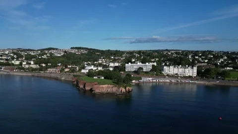 Torquay, S. Devon, England: DRONE VIEWS: Corbyn Head and Beach &amp; the Grand Hotel Stock Footage 246535052