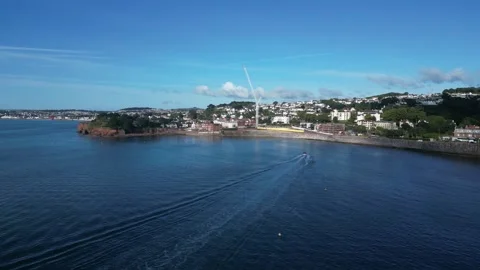 Torquay, S. Devon, England: DRONE VIEWS: Livermead Sands, Waterskier &amp; Speedboat Stock Footage 247490469