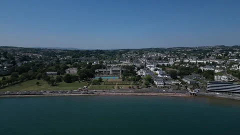 Torquay, South Devon, England: DRONE VIEWS: Torre Abbey Park, Meadows &amp; the Sea Stock Footage 243686233