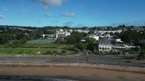 Torquay, South Devon, England: DRONE VIEWS: Seafront, Conference Centre, Funfair Stock Footage 247491376