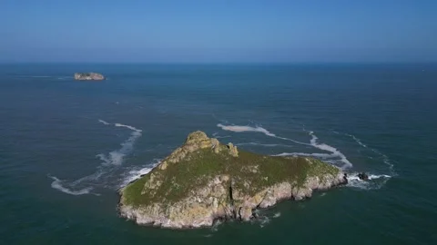 Torquay, Torbay, Devon, England: DRONE VIEWS: Thatcher Rock and Orestone Rock Stock Footage 242800264