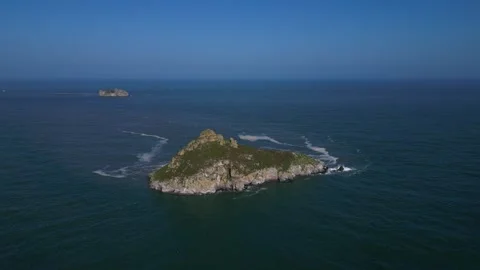 Torquay, Torbay, Devon, England: DRONE VIEWS: Thatcher Rock and Orestone Rock Stock Footage 242800664