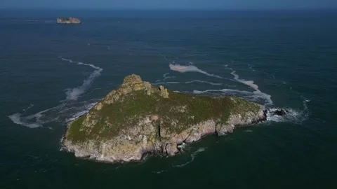 Torquay, Torbay, Devon, England: DRONE VIEWS: Thatcher Rock and Orestone Rock Stock Footage 242800731
