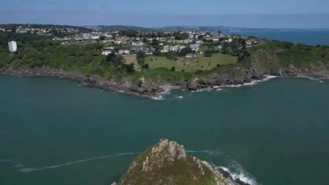 Torquay, Torbay, S. Devon, England: DRONE VIEWS: Thatcher Rock &amp; Thatcher Point Stock Footage 243217047