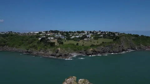 Torquay, Torbay, S. Devon, England: DRONE VIEWS: Thatcher Rock &amp; Thatcher Point Stock Footage 243219614