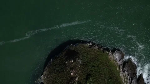 Torquay, Torbay, S. Devon, England: DRONE VIEWS: Overhead view of Thatcher Rock Stock Footage 243219618