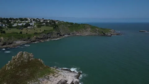 Torquay, Torbay, S. Devon, England: DRONE VIEWS: Thatcher Rock and Hope's Nose Stock Footage 243272982