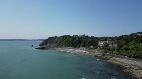 Torquay, Torbay, S. Devon, England: DRONE VIEWS: Meadfoot Beach &amp; Beach Chalets Stock Footage 243352358
