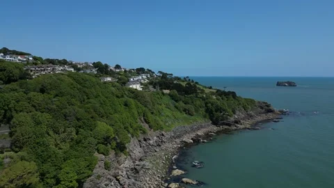 Torquay, Torbay, S. Devon, England: DRONE VIEWS: Thatcher Point &amp; Orestone Rock Stock Footage 243361562