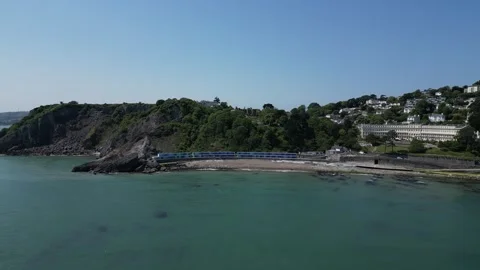 Torquay, Torbay, S. Devon, England: DRONE VIEWS: Meadfoot Beach &amp; Beach Chalets Stock Footage 243361620