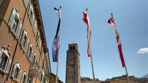 Torre Apponale Clock Tower with Flags in Riva del Garda Italy Summer 스톡 동영상 341500935