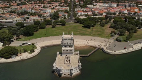 Torre de Belem in Lisbon, drone tilt shot of from top to horizon Video stock 106664458