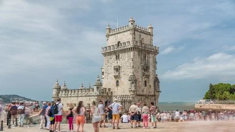 Torre de Belem or Belem Tower and wooden bridge timelapse hyperlapse on the R Stock Photos