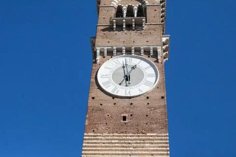 Torre dei Lamberti, the clock tower in Piazza delle Erbe. Verona, Italy Stock Photos