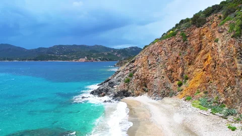 Torre del Budello tower, Teulada by rocky beach Sardinia Italy Mediterranean sea Stock Footage 287894088