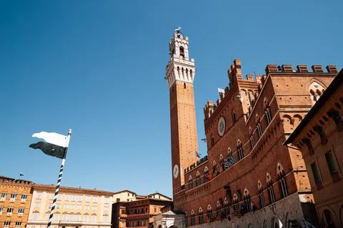 Torre del Mangia tower at Campo square in Siena, Italy Stock Photos