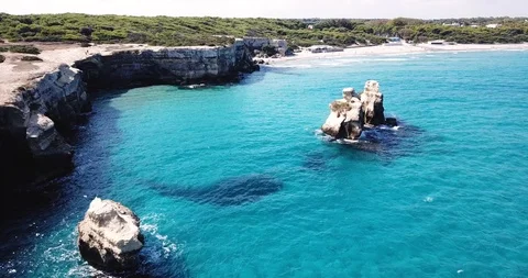 Torre Dell'Orso, Lecce, Puglia, Italy. Aerial view of the sea and cliffs Stock Footage