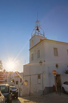 The Torre do Relogio Clock Tower in the historical old town area of Albufeira Stock Photos