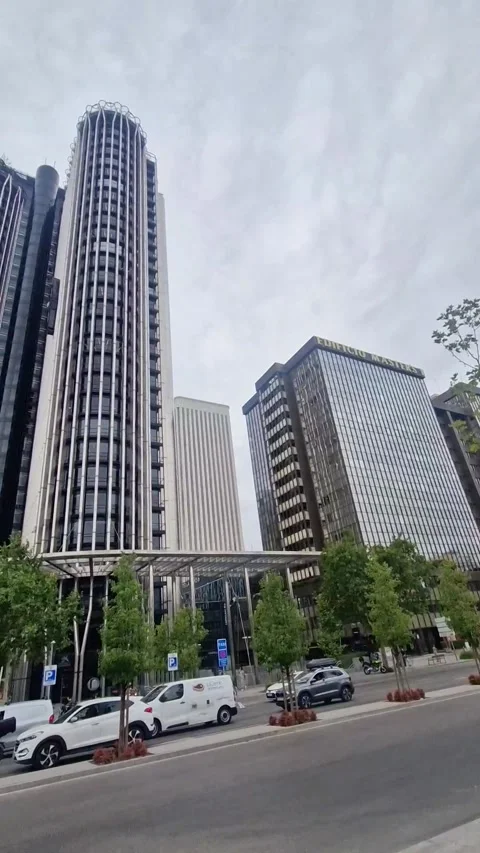 Torre Europa and Edificio Masters skyscrapers, vertical Madrid skyline pan Stock Footage 341342824