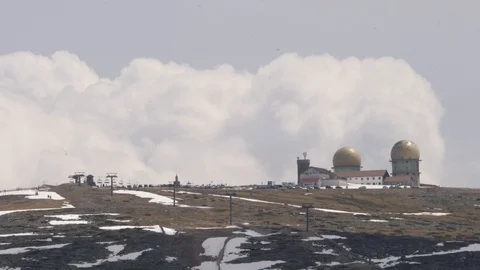 Torre tower highest point of Serra da Estrela in Portugal with snow Stock Footage 125394030